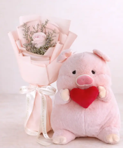 ช่อดอกไม้วาเลนไทน์กุหลาบสีชมพู พร้อมตุ๊กตาหมูจากร้าน Love You Flower